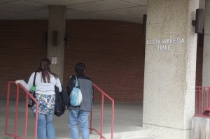 Students Entering LWH looking at the nameplate - Photo by Juan Gonzalez 