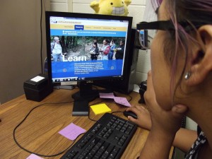 NEIU student enticingly navigates through the new website