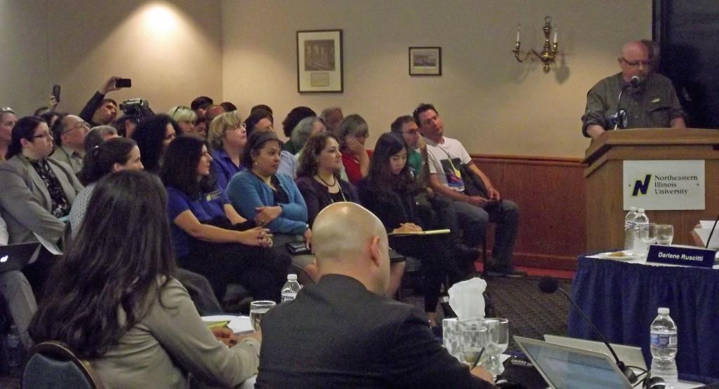 Student Trustee Amanda Sleflo (left) and Trustee Omar Duque (right) onlook a full audience during the most recent BoT meeting.