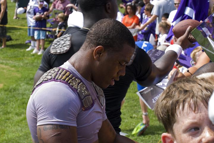 Ray Rice signing autographs.