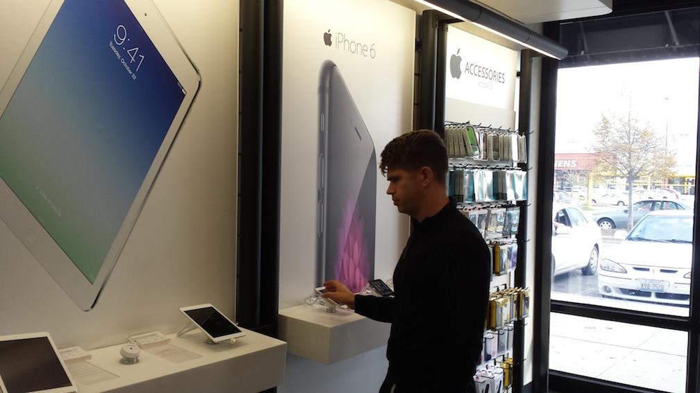 A Verizon customer shopping for iPhone 6. Apple Release. 
