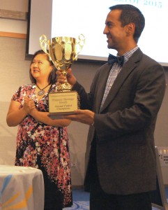 Dr. Frank Gaytan accepts the Annual Futbol Champions award on behalf of Team ENLACE.