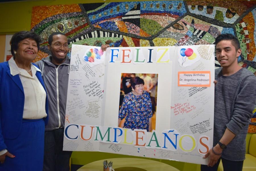 Students Alex Brown and Dan Villa pose with Dr. Angelina Pedroso.