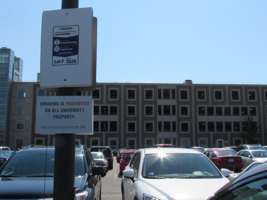 Information on the new parking system is displayed on signs throughout the lots.