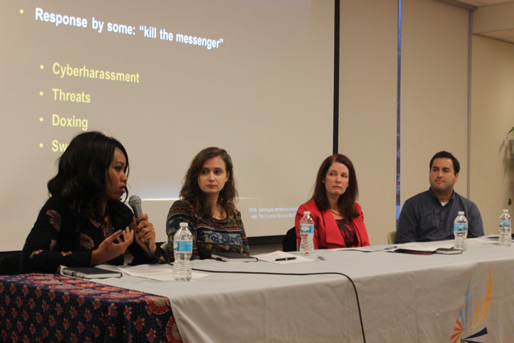 From Left to Right: Keisha Howard, Fruzsina Eördögh, Margaret M. Ogarek and Adam M. Messinger. Howard answers a question during the Game Over? panel.
