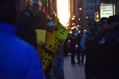 Protesters complied with Chicago police to keep the road clear after demonstrators shortly clashed with motorists on Monroe street.