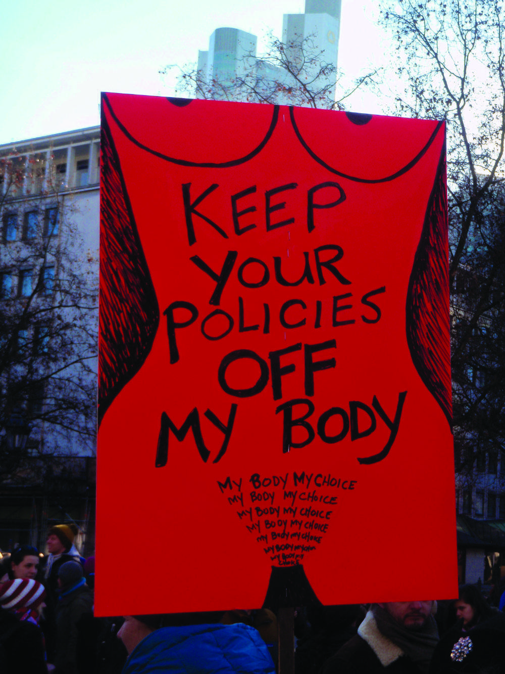 The Global Gag Rule sparked protests internationally. Pictured above is a sign from a Women’s March in Frankfurt, Germany.