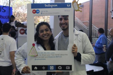 Students eat ‘100 grand’ for U.S. national debt awareness