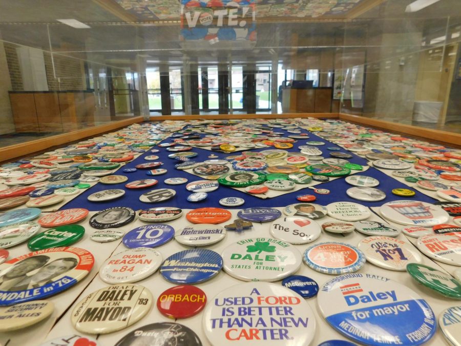 Archival political pins in the Ronald Williams Library. Display set up by Digital Scholarship Librarian and Assistant Professor Alyssa Vincent, Social Sciences Librarian and Assistant Professor Ed Remus and Administrative Assistant Bonnie Pfeiffelman.