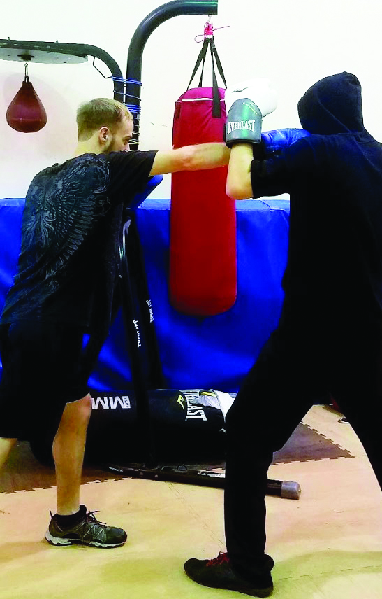 Phillip Noffz and Matthew Scanlan sparring at boxing club| Photo by Rachel Willard