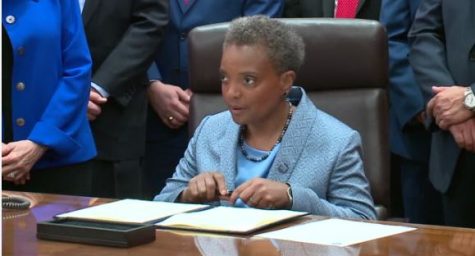 WATCH: Chicago Mayor Lori Lightfoot plays guitar, basketball to 'save lives'