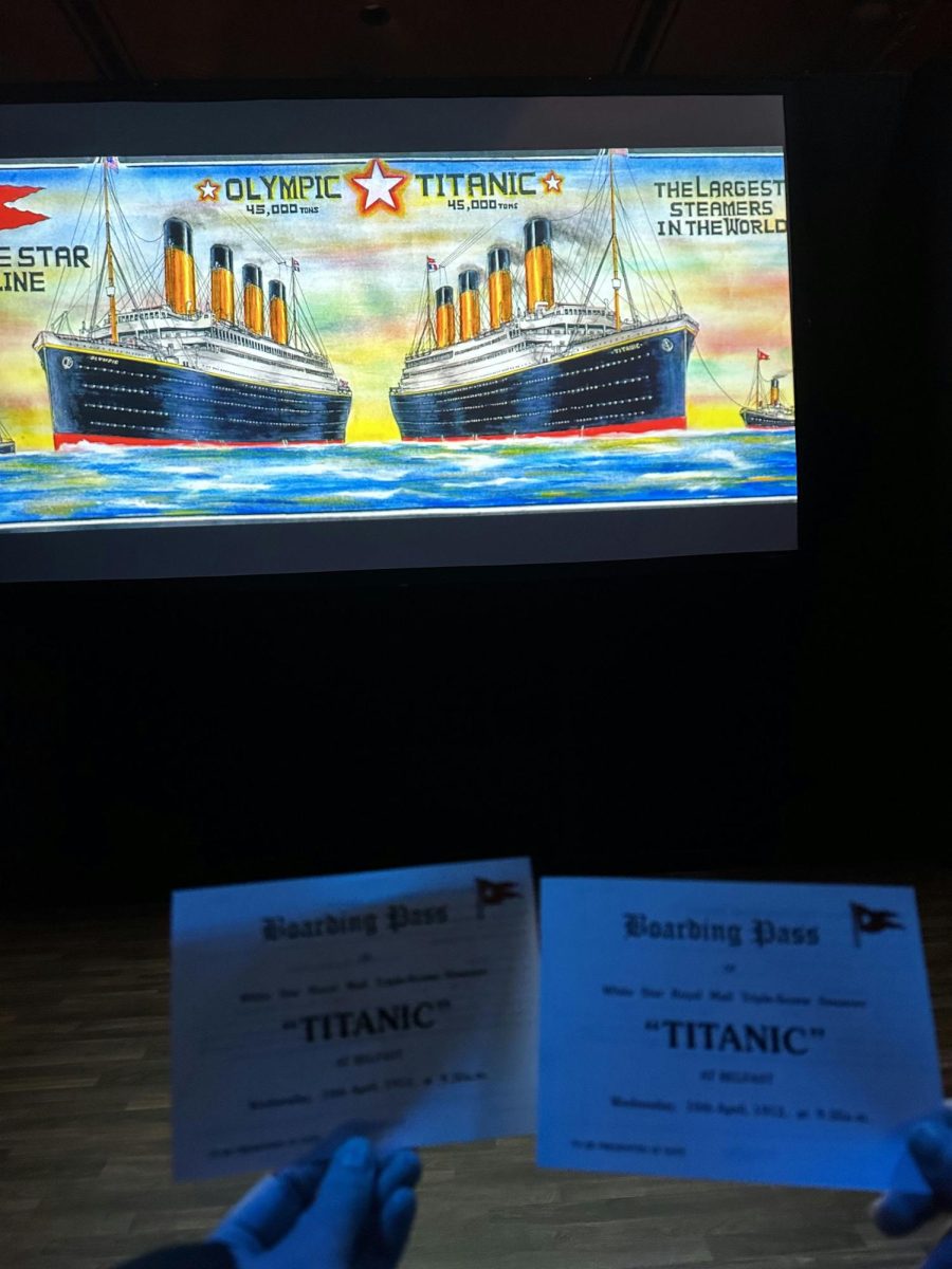 As you enter the exhibit, youre given a boarding pass of the Titanic and a backstory of a person on the ship is explained on the back of each pass.