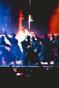 Rauw with backup dancers performing IL Capo during his first Act of the show.